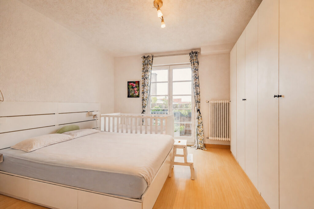 Schlafzimmer mit Balkon